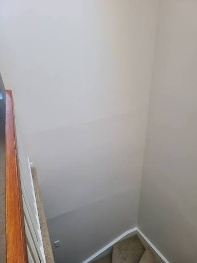 Visible drywall seams and bands
